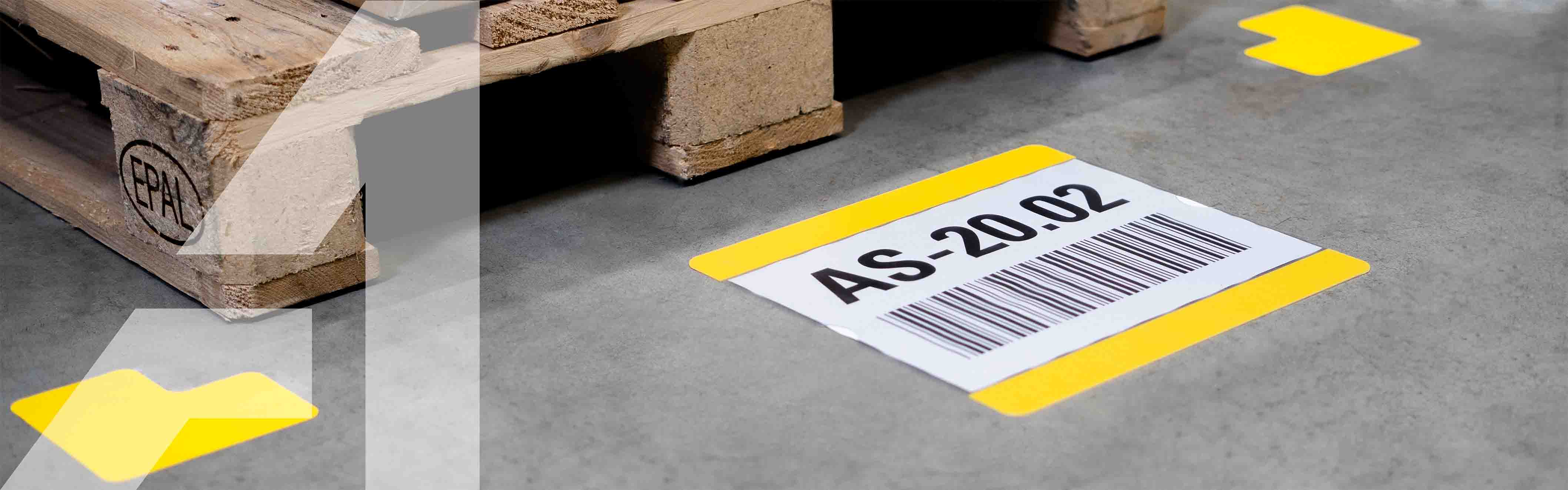 Labeling pockets with inserted paper for marking pallet locations.